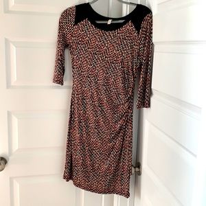 Women’s small black, cream and red patterned dress